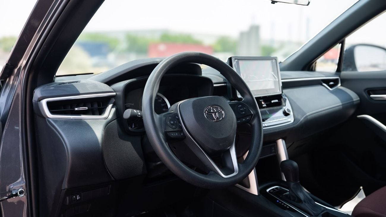 Toyota Corolla Cross 2025 Toyota Corolla Cross MID 1.8 Hybrid - Grey Mettalic Inside Red | Export Only