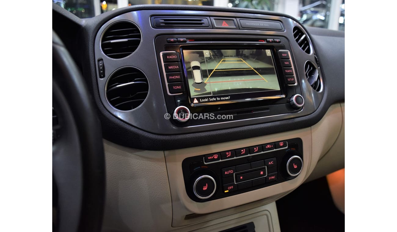Volkswagen Tiguan SEL EXCELLENT DEAL for our Volkswagen Tiguan 2.0 TSi 4Motion ( 2014 Model! ) in Black Color! GCC Spe