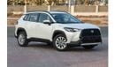 تويوتا كورولا كروس 2024 TOYOTA COROLLA CROSS 1.8 Hybrid MID - PLATINUM WHITE PEARL inside RED | Export Only
