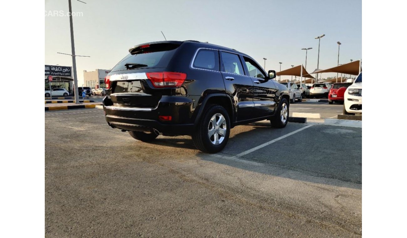 Jeep Grand Cherokee 2012 Full options Hemi Panorama roof navigation leather interiors