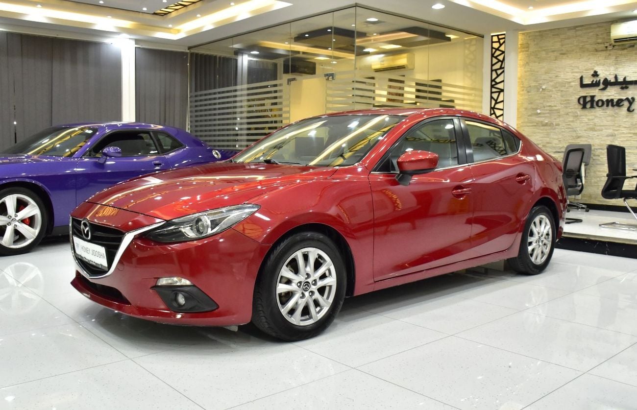 Mazda 3 EXCELLENT DEAL for our Mazda 3 ( 2015 Model ) in Red Color GCC Specs