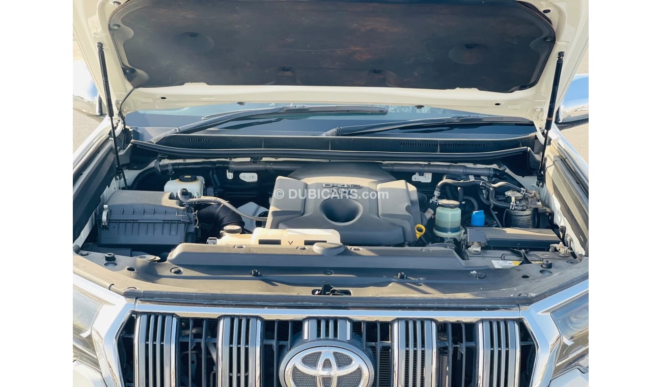 تويوتا برادو Toyota prado Diesel engine 2.7 model 2017 from japan white color 7 seater car very clean and good co