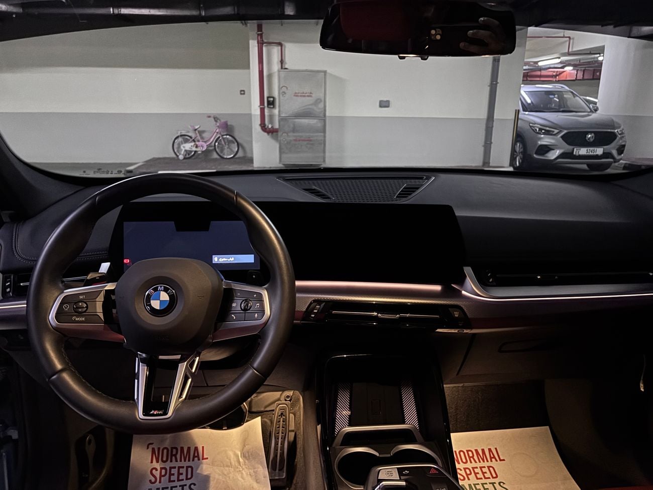 BMW X1 Veganza Coral Red/Black Interior
