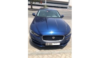 جاغوار XE Prestige model 2016 -luxury car with Fantastic Royal Blue Body ivory Leather - excellent condition