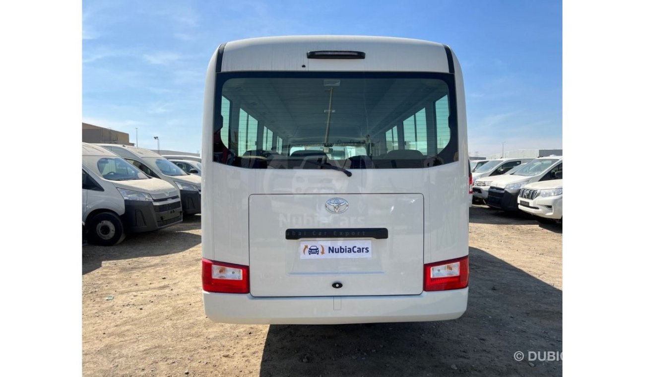 New 2023 Model Toyota Coaster High-Roof 23-Seater 4.2L 6-Cyl Diesel M/T RWD  2023 for sale in Dubai - 664276
