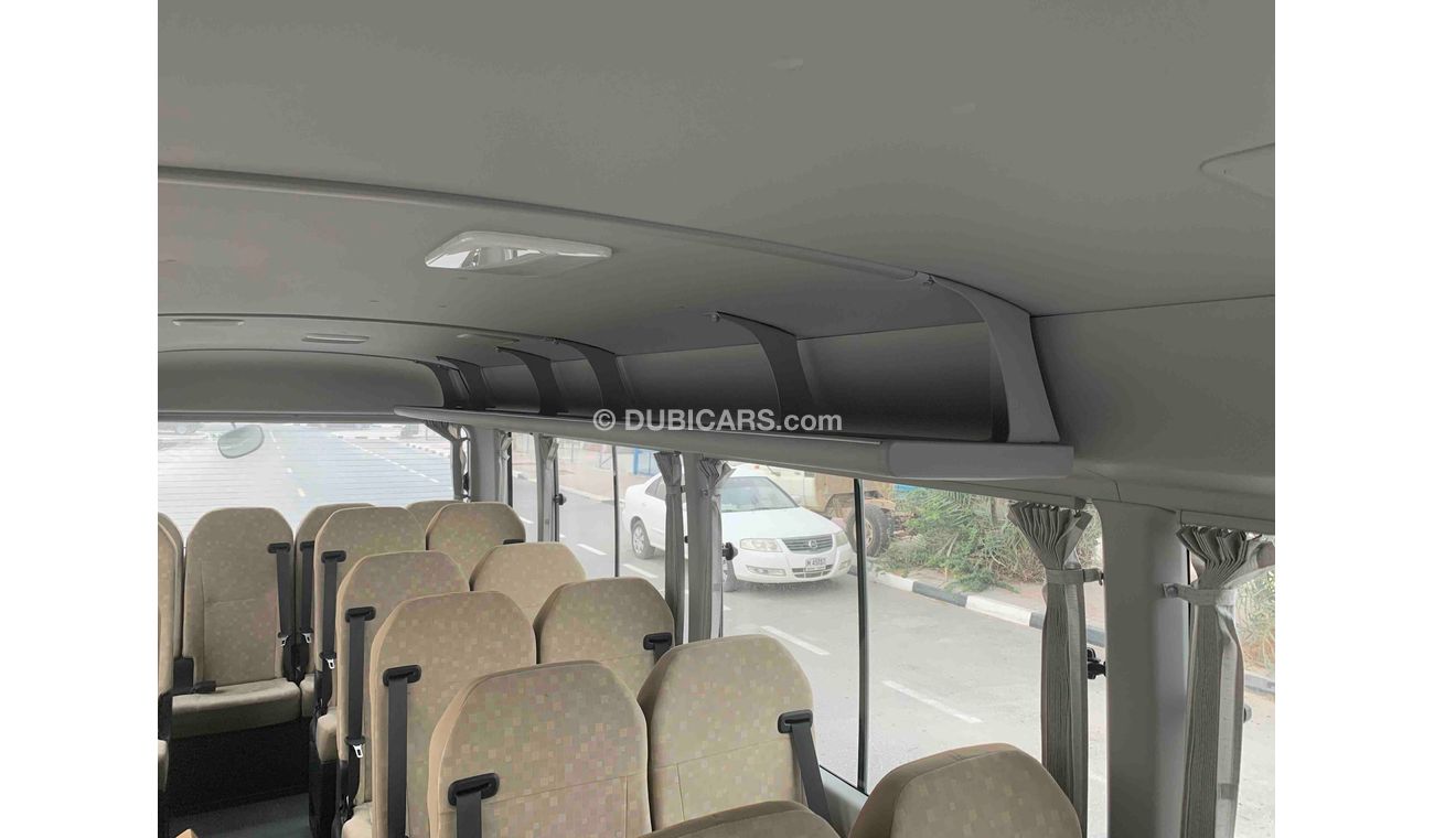 Toyota Coaster FULL OPTION — V6 — 4200cc — DIESEL—22 SEAT -- 3 POINT SEAT BILT - LUGGAGE RACK - CURTAINS - FRIDGE