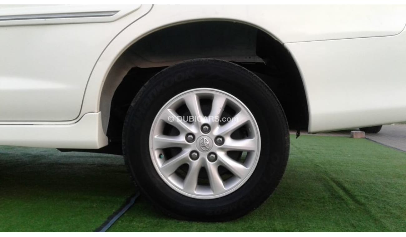 تويوتا إينوفا ابيض خليجى 2015 فتحة سقف رقم 1فل ابشن كامل بحالة جيدة