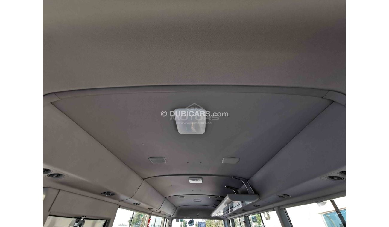 Toyota Coaster 2.7L PETROL, 17.5" TYRE, FABRIC SEATS, XENON HEADLIGHTS (CODE # TC01)
