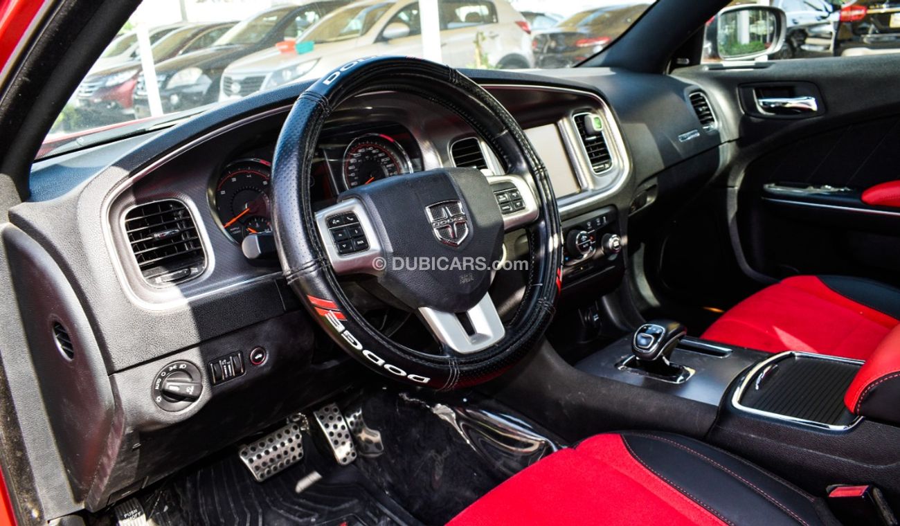 Dodge Charger Import - one number - manhole - leather - rear spoiler - cruise control - alloys - sensors in an abs