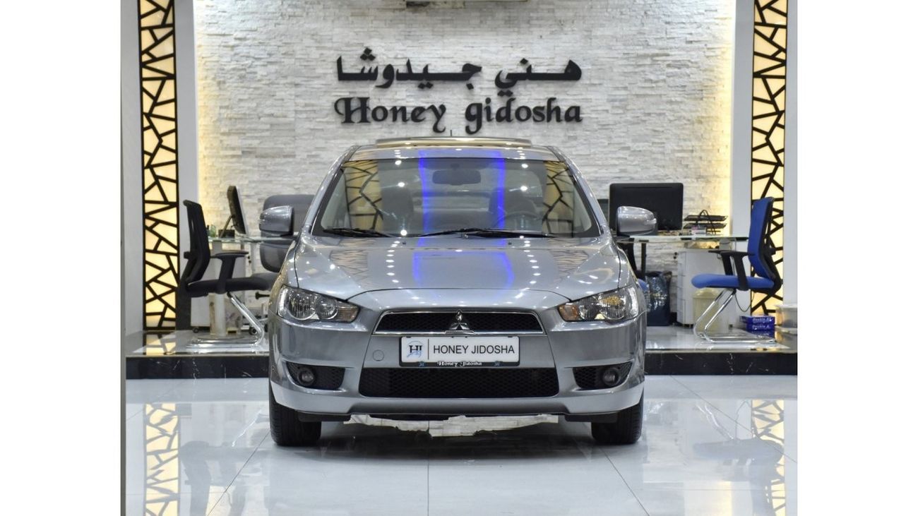 Mitsubishi Lancer EXCELLENT DEAL for our Mitsubishi Lancer GLS ( 2016 Model ) in Silver Color GCC Specs