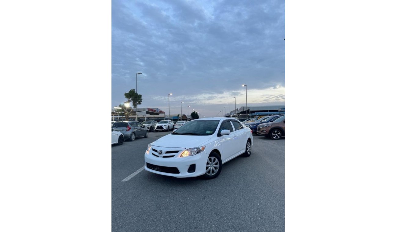 Toyota Corolla This car is in perfect condition, 2013, with an engine capacity of 1.8 and a manual transmission.