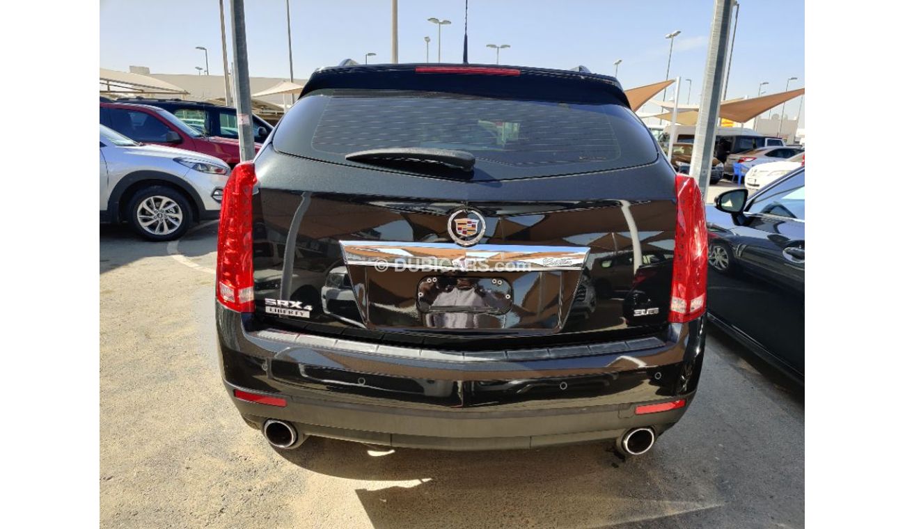 Cadillac SRX 2014 model GCC specs full options panorama clean car 3.6ltr