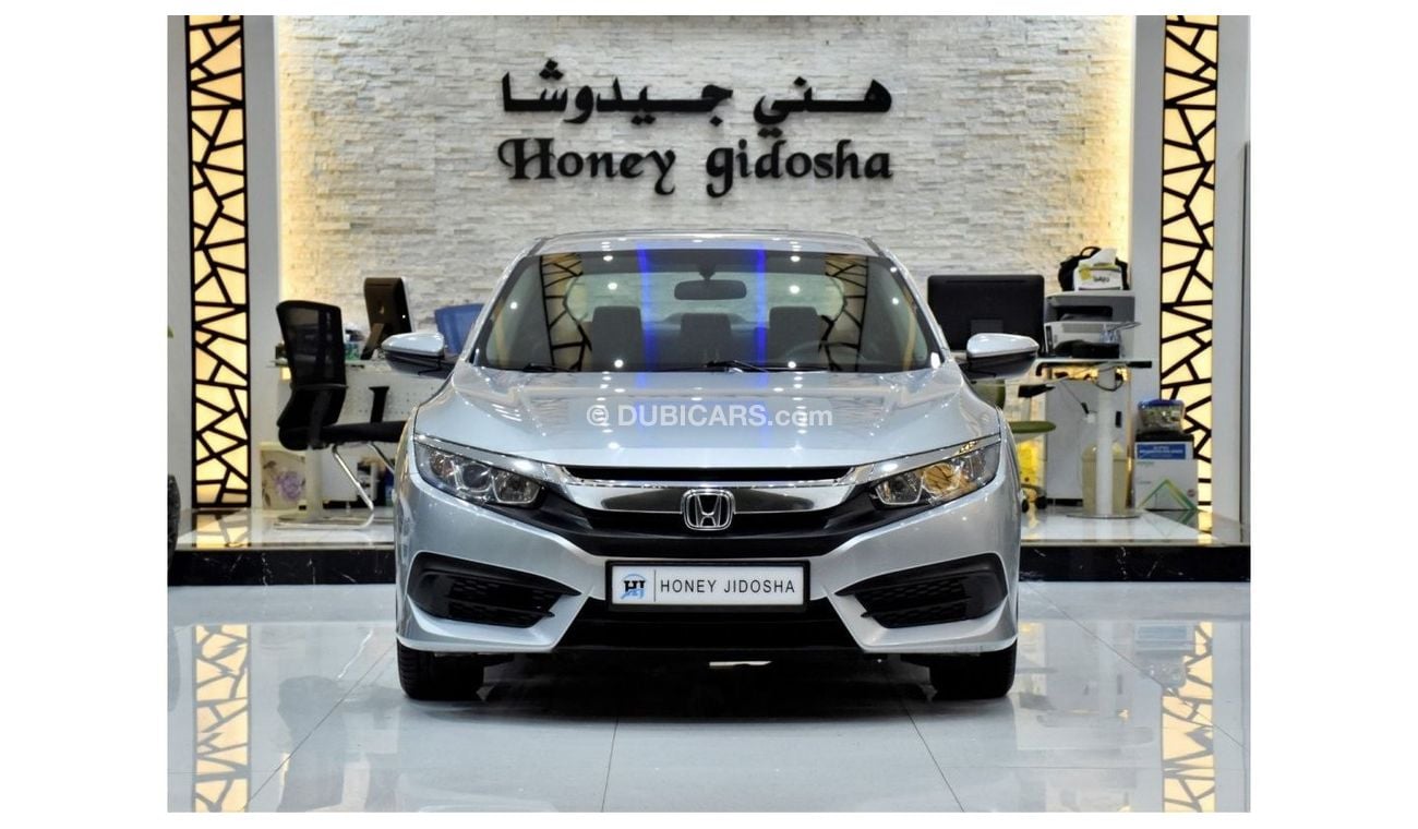 Honda Civic EXCELLENT DEAL for our Honda Civic ( 2016 Model ) in Silver Color GCC Specs