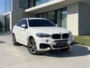 بي أم دبليو X6 AED 1,880 P.M | 0% DOWN PAYMENT | BMW X6 XDRIVE35I M KIT | AGENCY SERVICE HISTORY | 2019 | GCC SPECS