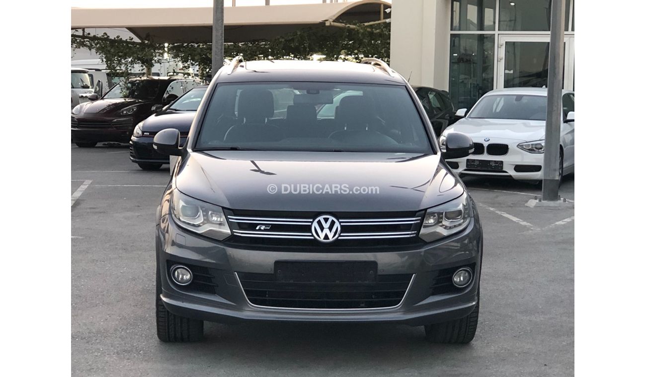 فولكس واجن تيجوان موديل 2014 خليجي فل مواصفات كراسي جلد ومثبت سرعه وتحكم كهربي كامل ونظام صوت ممتاز وكاميرا خلفيه