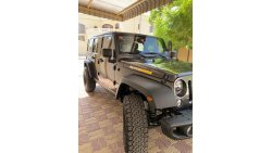 Jeep Wrangler Sport JK Unlimited Fully modified extended MOPAR till August 2023 warrantu