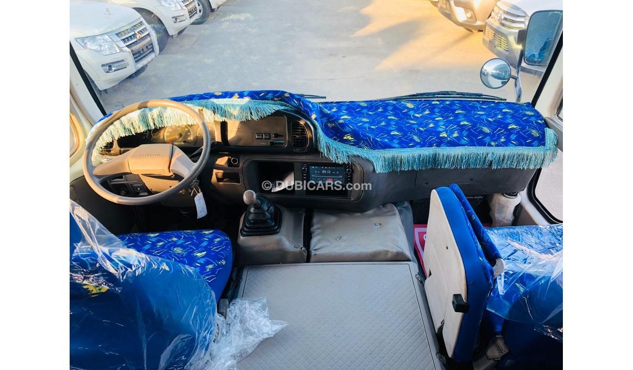 Toyota Coaster 30 SEATER------4.2L-DIESEL------LIKE BRAND NEW-DVD-REAR CAMERA-----ESPECIALMENTE PARA ANGOLA