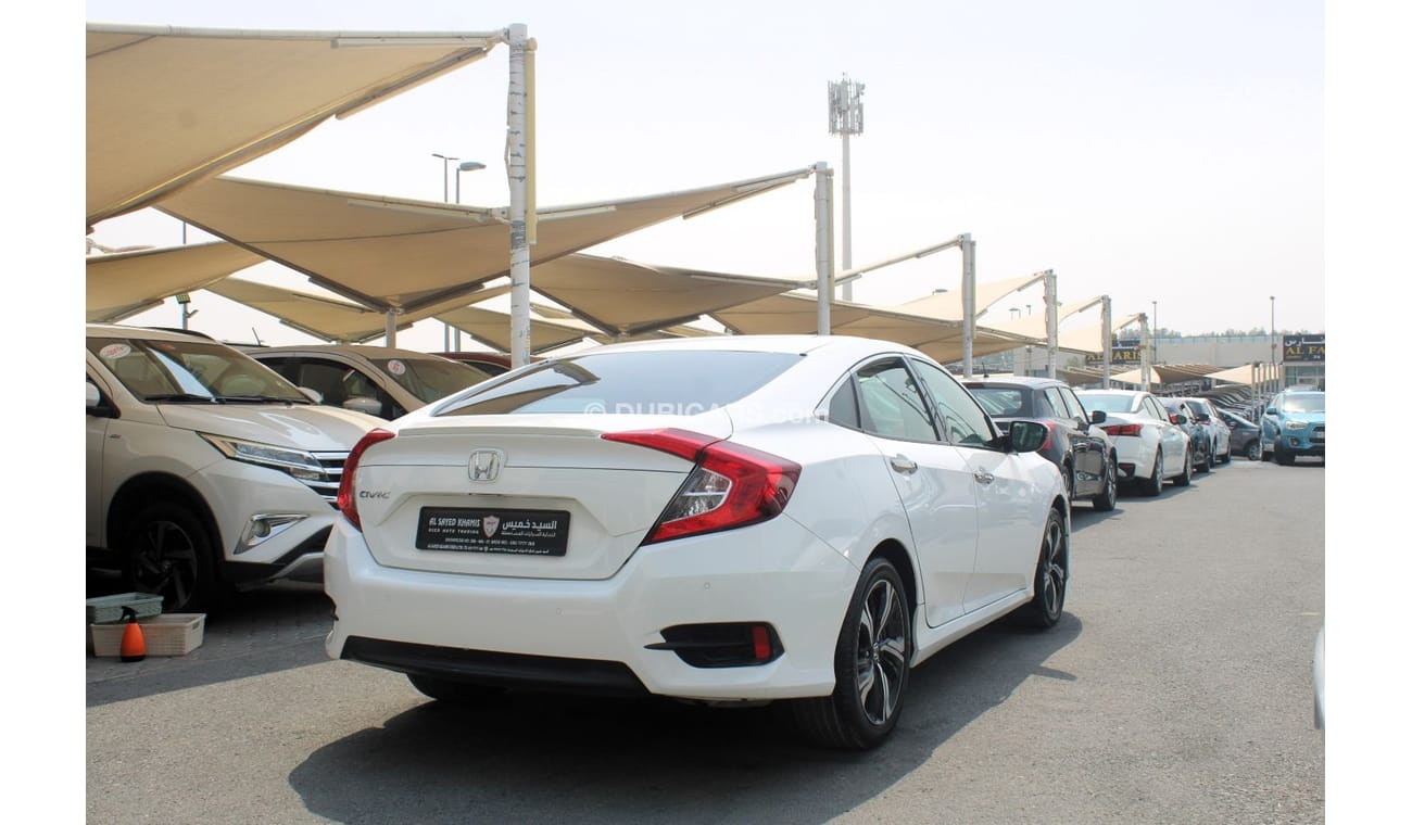 هوندا سيفيك DX خالية من الحوادث - خليجي - مكينة 1600 سي سي - صبغة وكالة