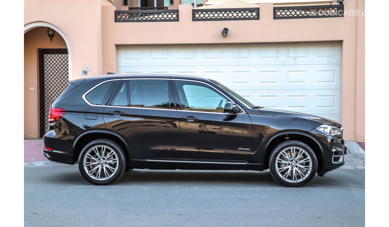 BMW X5 X-Drive 50i 2014 GCC under Agency Warranty & Service contract with Zero Down-Payment.