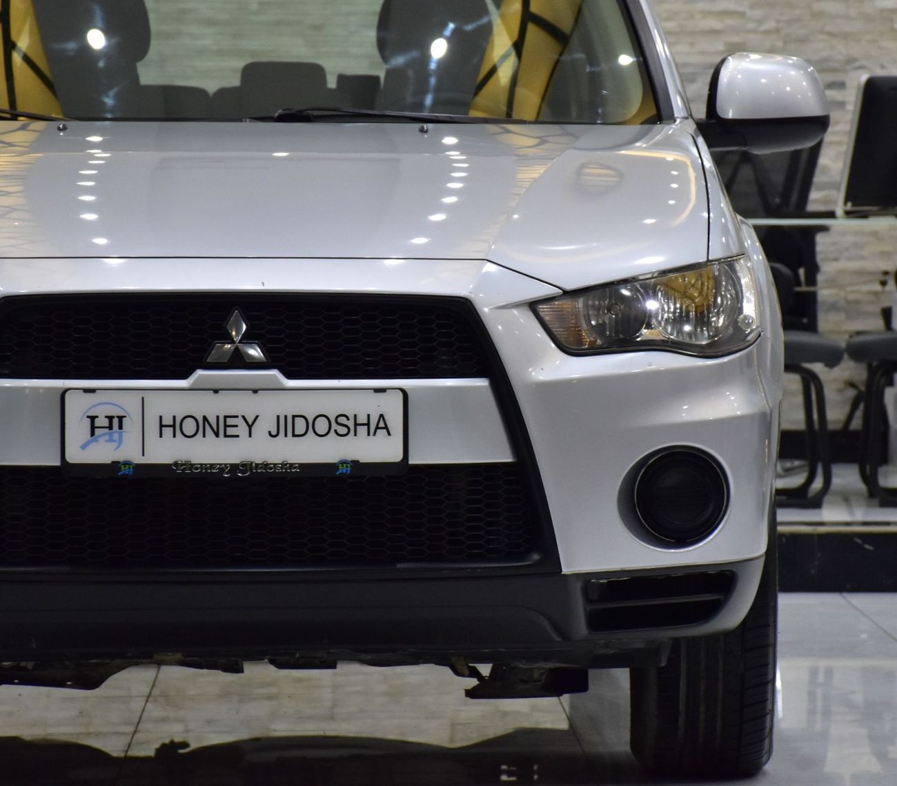 Mitsubishi Outlander EXCELLENT DEAL for our Mitsubishi Outlander 4WD ( 2012 Model ) in Silver Color GCC Specs