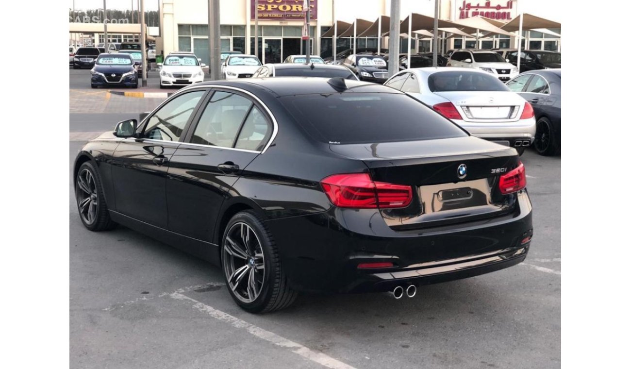 BMW 320i BMW 320 MODEL 2018 GCC car prefect condition leather seats back camera