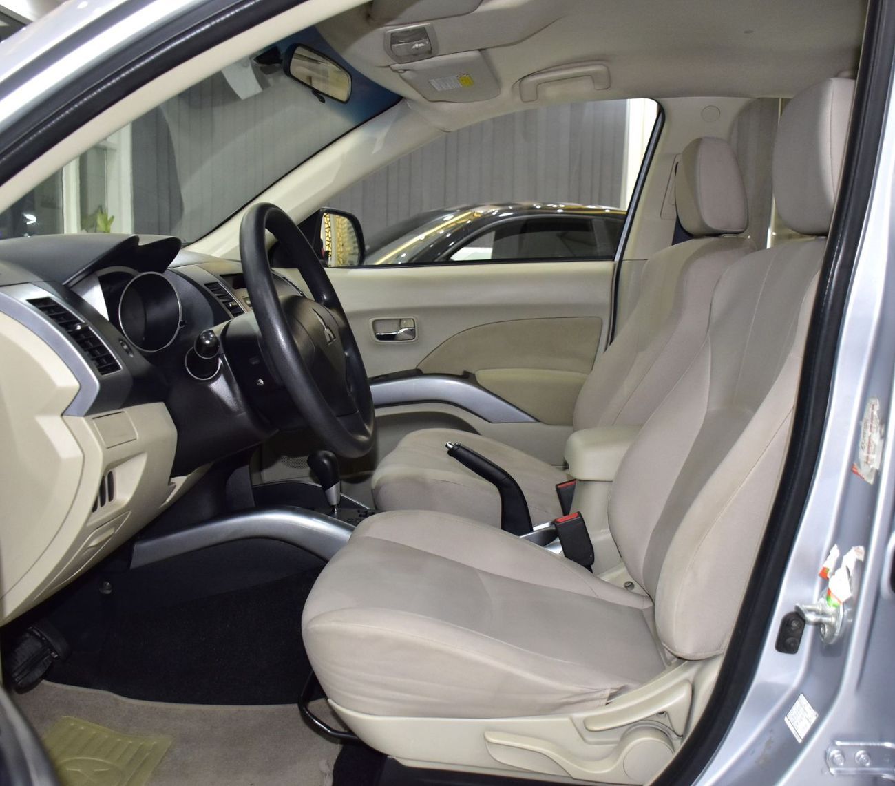 Mitsubishi Outlander EXCELLENT DEAL for our Mitsubishi Outlander 4WD ( 2012 Model ) in Silver Color GCC Specs