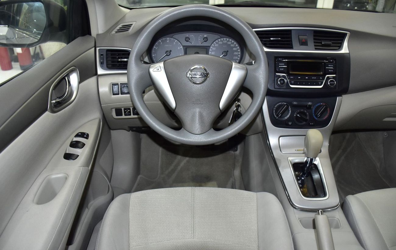 Nissan Sentra EXCELLENT DEAL for our Nissan Sentra ( 2018 Model ) in Silver Color GCC Specs