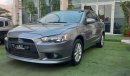 Mitsubishi Lancer Gulf gray color inside beige without accidents Rings rear wing sensors fog lights in excellent condi