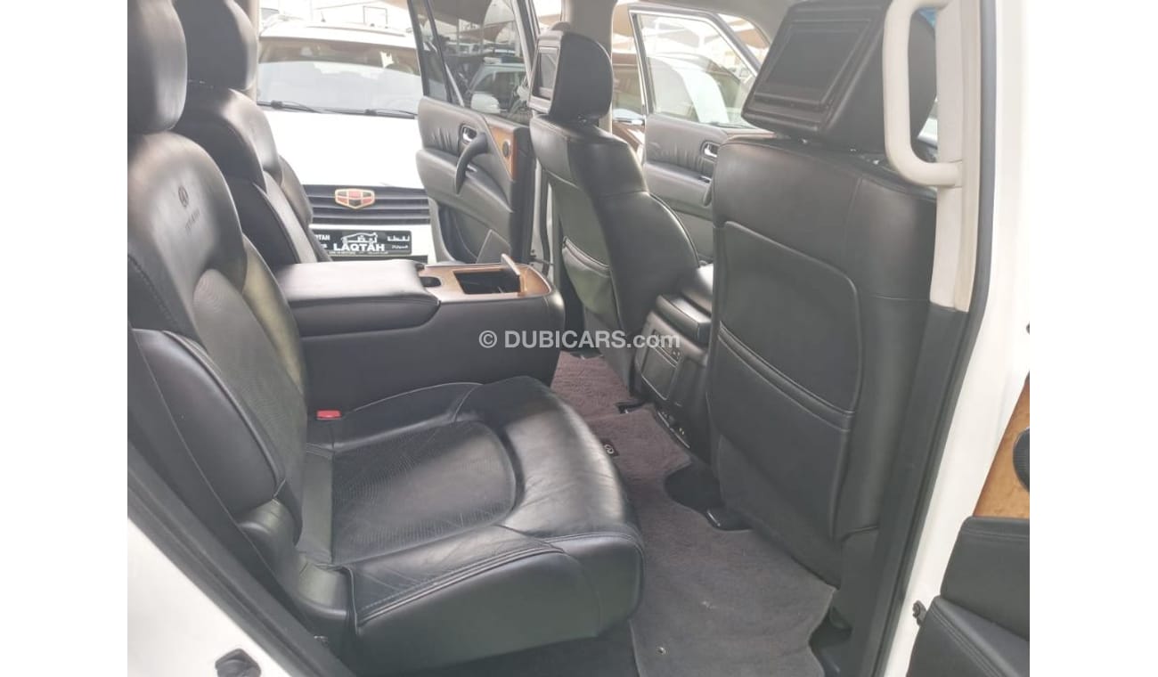Infiniti QX56 Model 2011 imported, white color, leather opening, alloy wheels, sensors, speed stabilizer, in excel