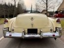 كاديلاك سيريس 62 1949 Cadillac Series 62 Convertible – Fiesta Ivory – Red Leather – Matching Numbers – Collector Grad