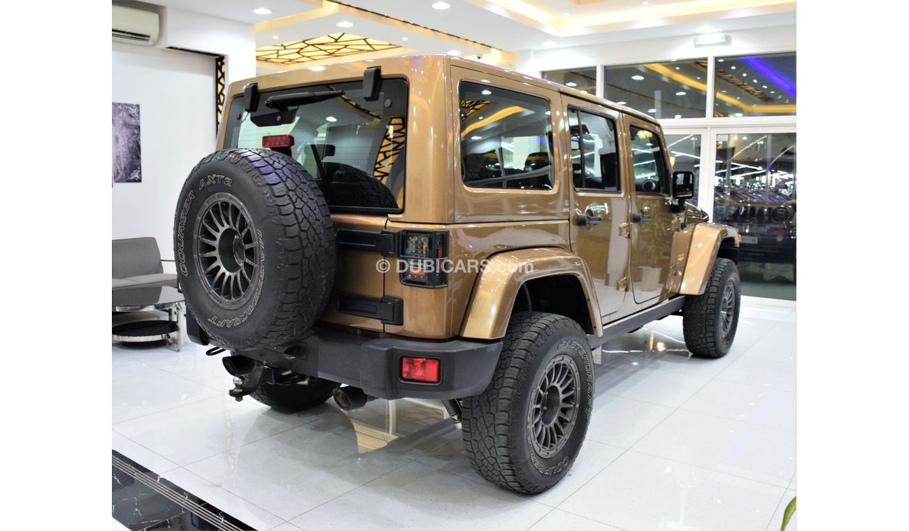 Jeep Wrangler Sahara EXCELLENT DEAL for our Jeep Wrangler UNLIMITED SAHARA 4x4 ( 2015 Model! ) in Brown Color! GCC