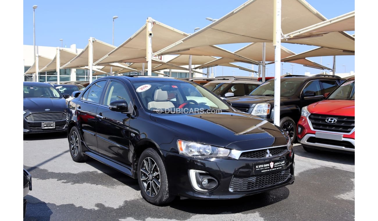 ميتسوبيشي لانسر GLS هاي خالية من الحوادث - خليجي - مكينة 2000 سي سي - رقم واحد - السيارة بحالة ممتازة من الداخل والخ