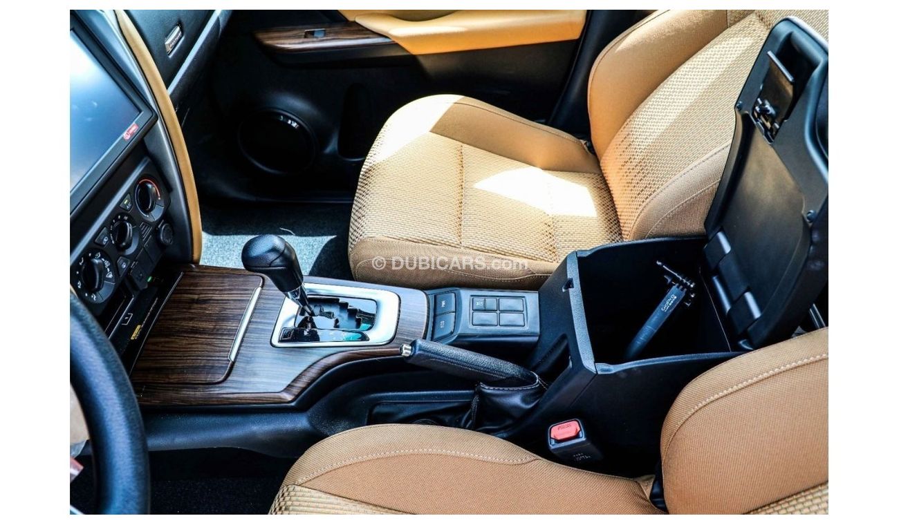 Toyota Fortuner 2023 Toyota Fortuner 2.7 4x2 P AT - Pearl White inside Chamois