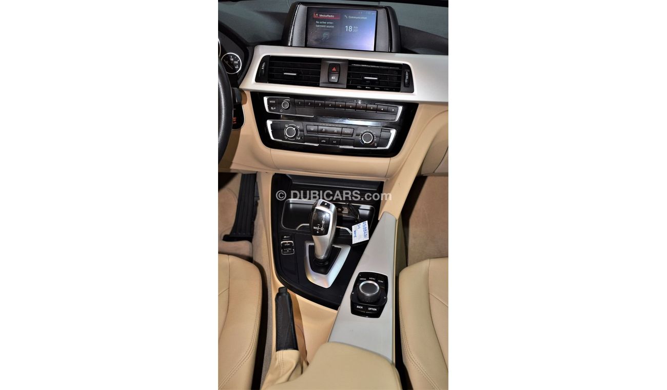 BMW 318i EXCELLENT DEAL for our BMW 318 i ( 2018 Model ) in White Color GCC Specs
