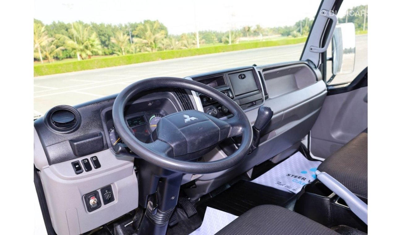 Mitsubishi Fuso Canter | Long Chassis | Shutter Box Water Body | Excellent Condition | GCC