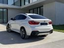 بي أم دبليو X6 AED 1,880 P.M | 0% DOWN PAYMENT | BMW X6 XDRIVE35I M KIT | AGENCY SERVICE HISTORY | 2019 | GCC SPECS