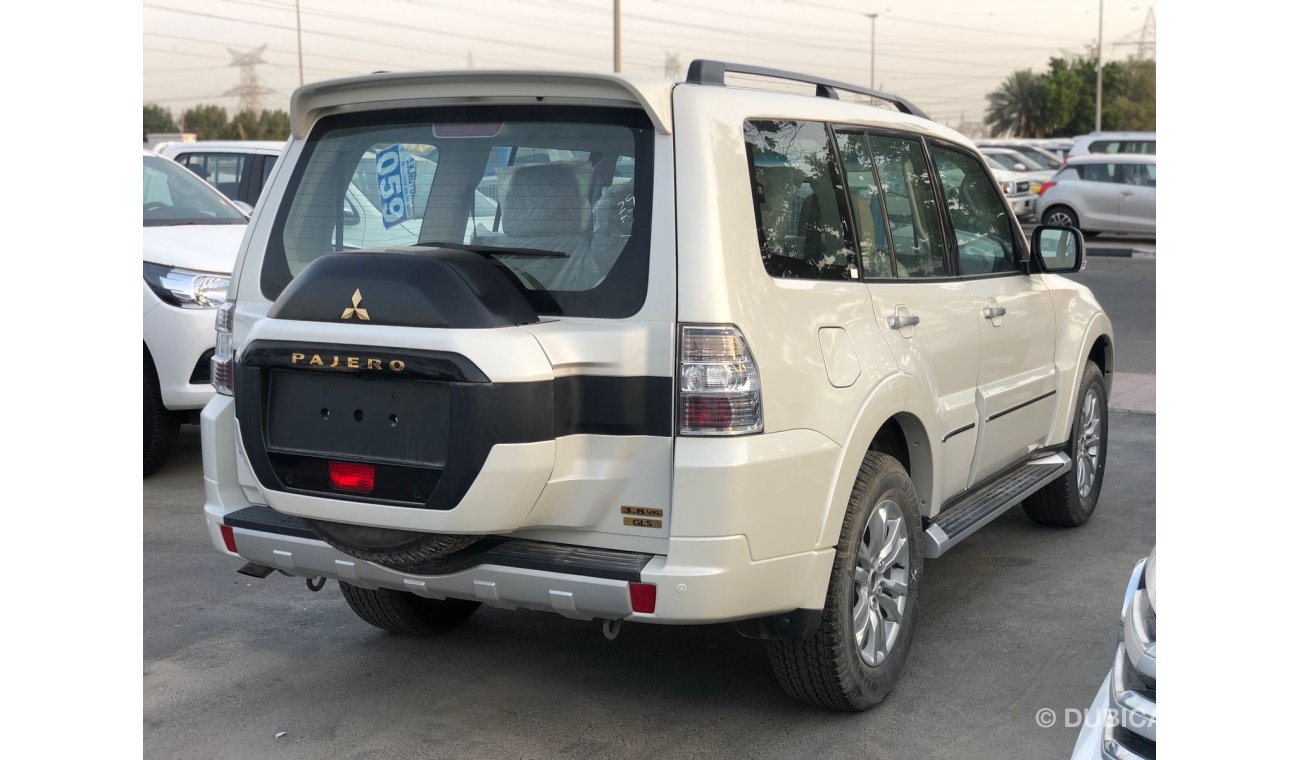 ميتسوبيشي باجيرو 3.8L Petrol / DVD / Driver Power Seat & Leather Seats / Rear AC (CODE # 9002)