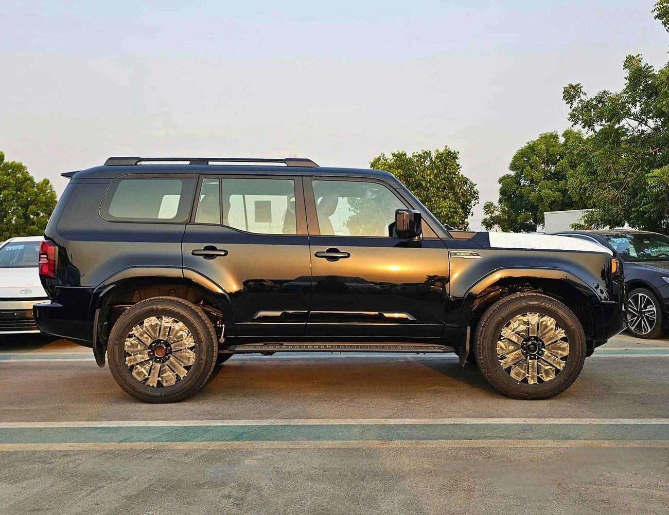 Toyota Prado PLATINUM | 2.4L V4 PETROL | PANORAMIC ROOF | 360* with HID | RADAR | MEMORY SEATS | TOP VARIANT