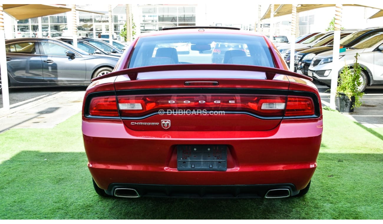 Dodge Charger Import - number one - hatch - leather - rear spoiler - cruise control - alloy wheels - sensors in ex