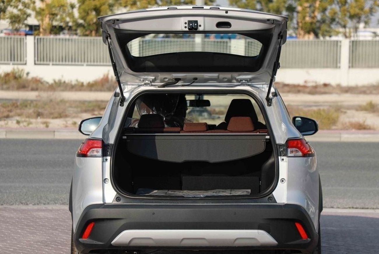 تويوتا كورولا كروس 2024 TOYOTA COROLLA CROSS 1.8 Hybrid MID - SILVER inside RED | Export Only