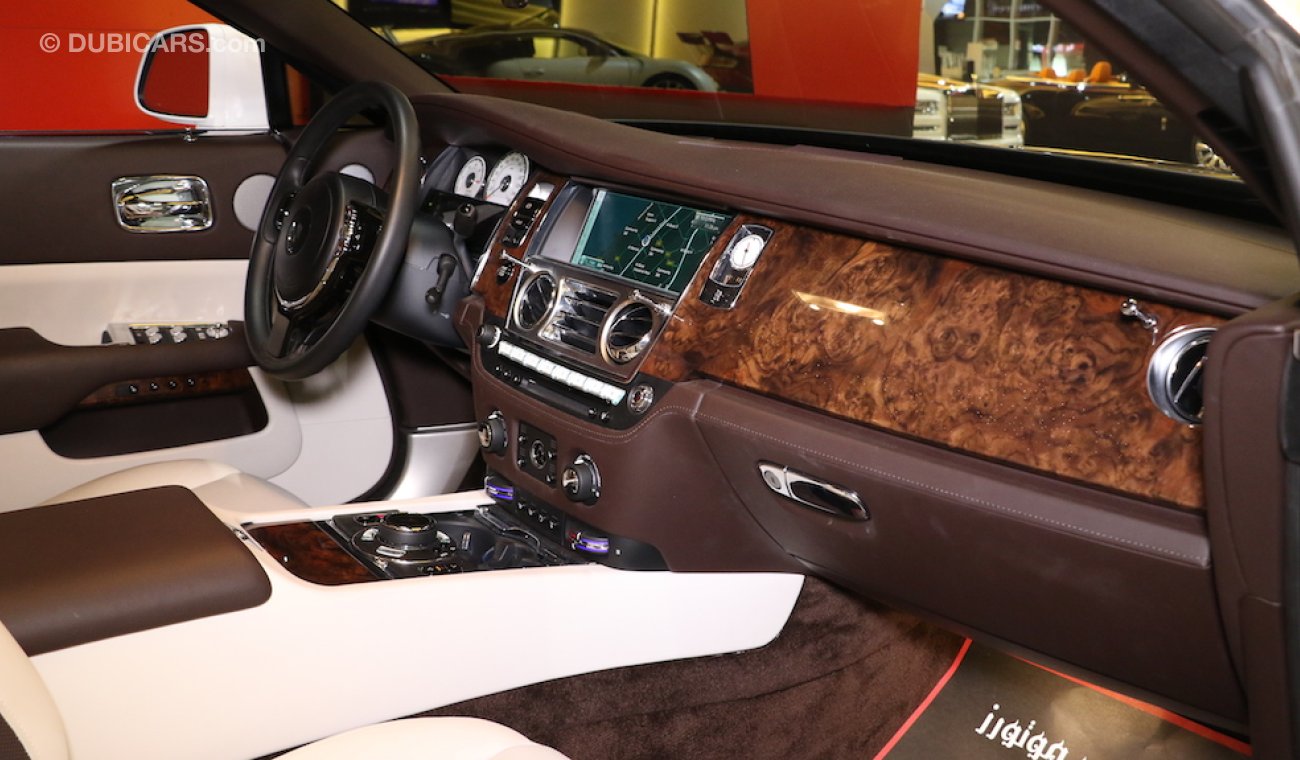 Rolls-Royce Wraith Original Color:  Brown | Silver  ( car with White Vinyl Sticker )