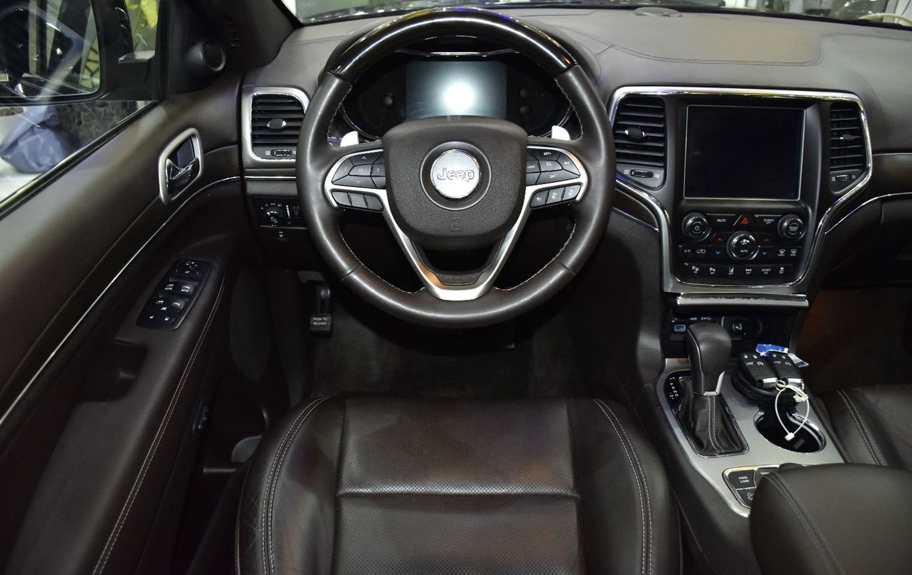 Jeep Grand Cherokee EXCELLENT DEAL for our Jeep Grand Cherokee Overland 4x4 ( 2018 Model ) in Black Color GCC Specs