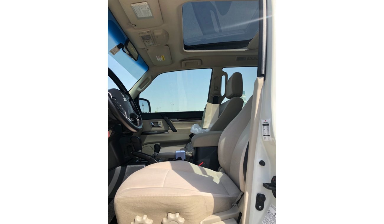 ميتسوبيشي باجيرو GCC EMI 1030X60 , 0% DOWN PAYMENT,MINT CONDITION ,SUNROOF