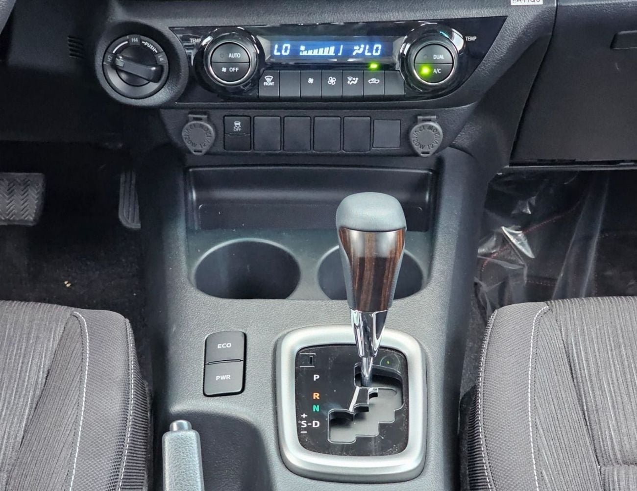 Toyota Hilux TOYOTA HILUX SR5 WIDE BODY DOUBLE CABIN || 2.7L PETROL A/T 4WD | BSM, WINOW VISOR, FOG LIGHTS, WOOD