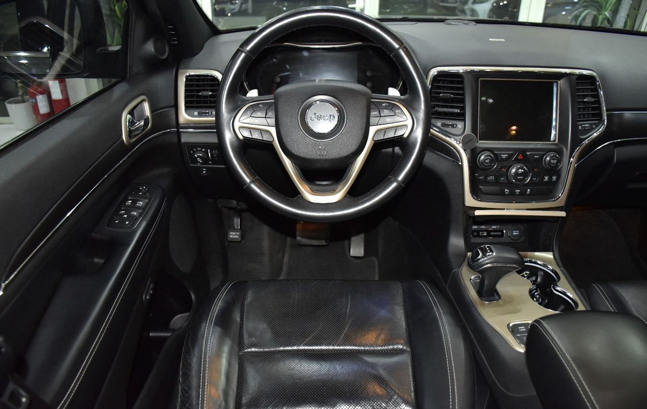 Jeep Grand Cherokee EXCELLENT DEAL for our Jeep Grand Cherokee Limited 4x4 ( 2015 Model ) in Grey Color GCC Specs