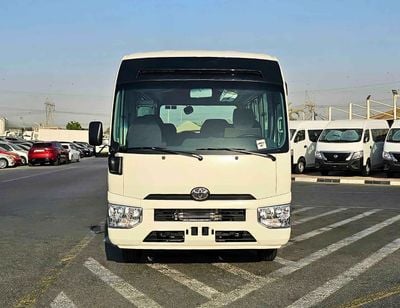 تويوتا كوستر 23 SEATER / 2.8L DIESEL A/T / AUTO DOOR/ HLF LUGGAGE RACK / PWR WINDOWS (CODE#COD28B)