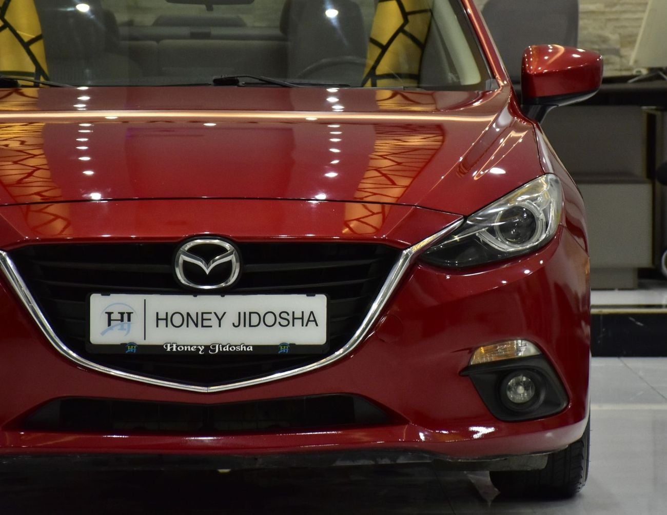 Mazda 3 EXCELLENT DEAL for our Mazda 3 ( 2015 Model ) in Red Color GCC Specs