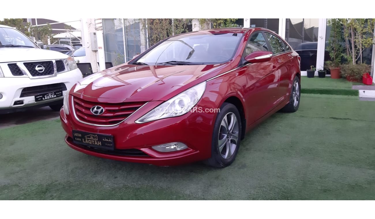 هيونداي سوناتا خليجى -2013 رنجات - مشغل اقراص - نوافذ كهربائية لون أحمر داخل رصاصى بحالة ممتازة لاتحتاج لاى مصاريف