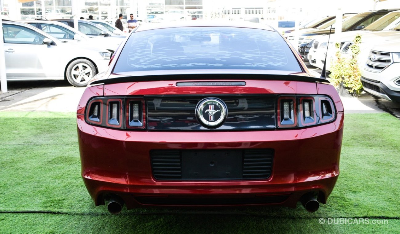 Ford Mustang Coupe, red color inside black, in excellent condition, you do not need any expenses