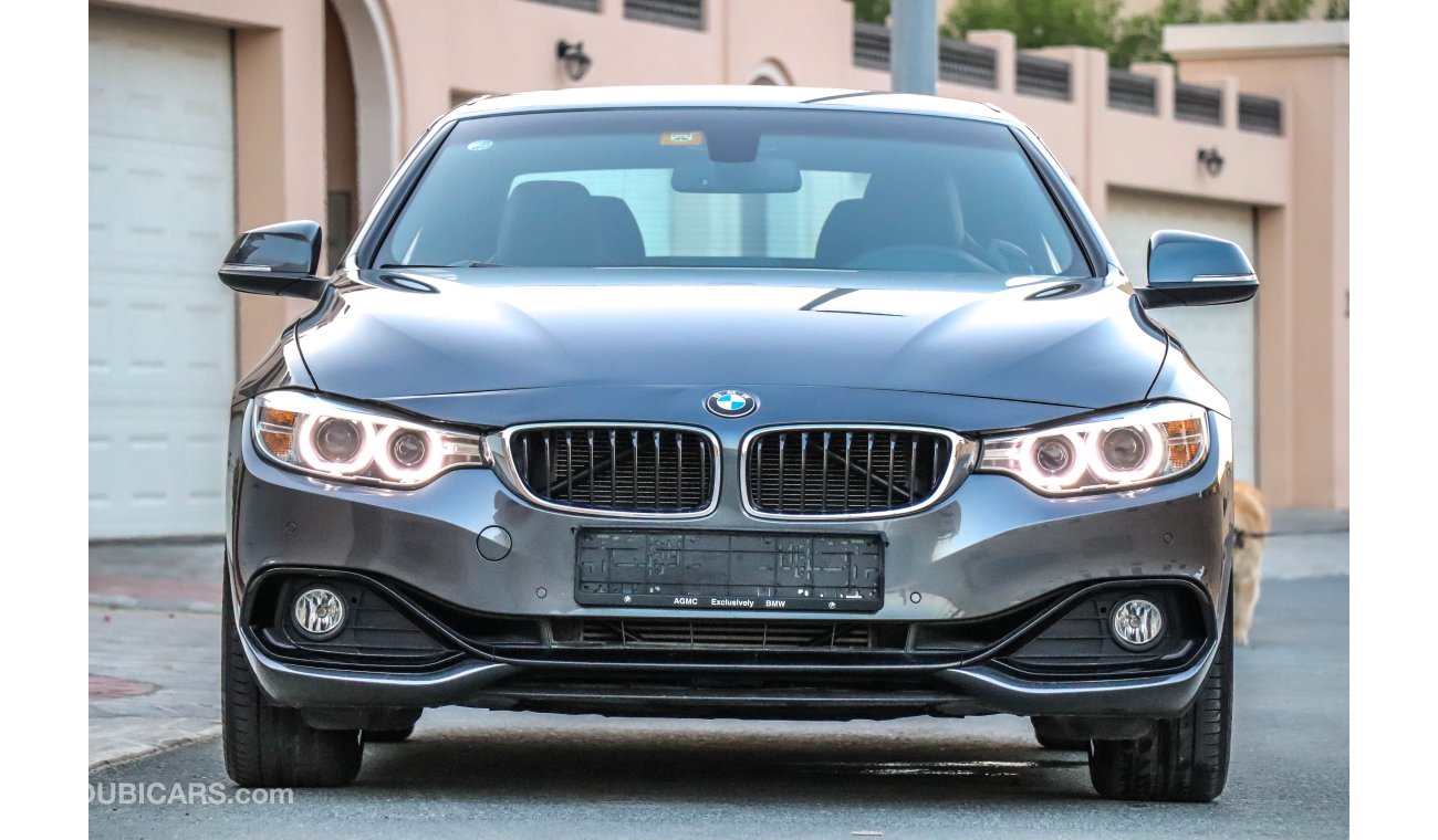 BMW 420i i 2015 GCC under Agency Warranty with Zero Down-Payment.